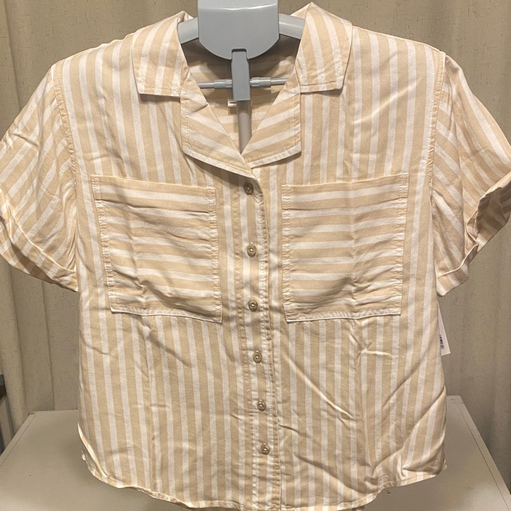 Woman’s short sleeve button front tan and white striped shirt